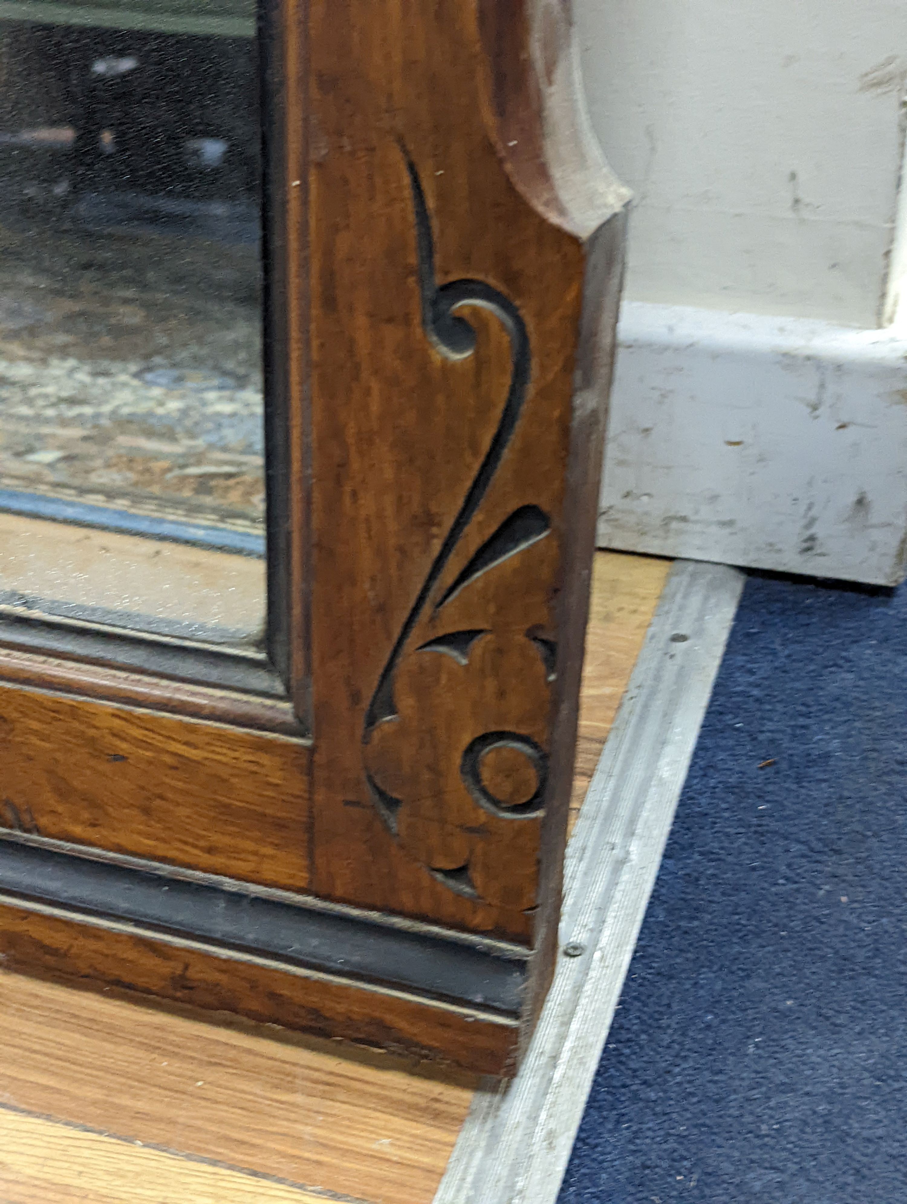 A large late Victorian aesthetic movement part ebonised oak overmantel mirror, width 162cm, height 197cm